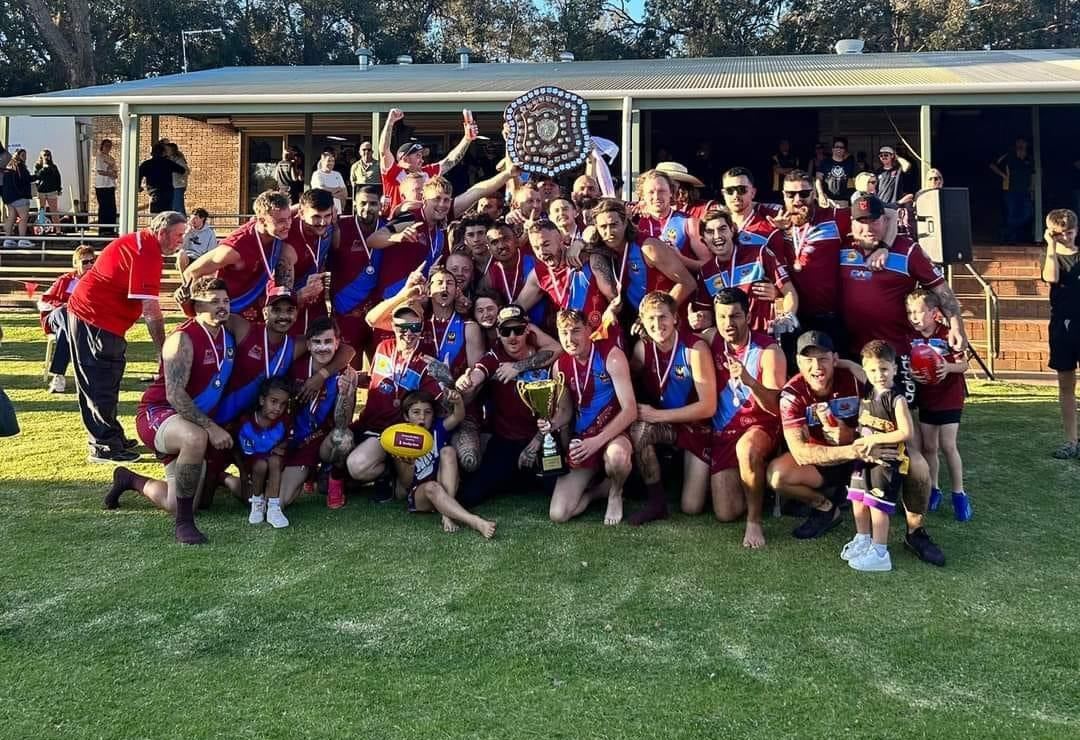 League premiers 2024 holding the shield